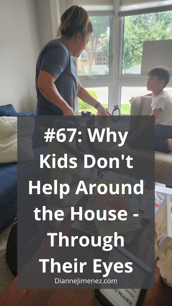 Mom vacuuming and pointing as though she's teaching and her son watching and listening to her