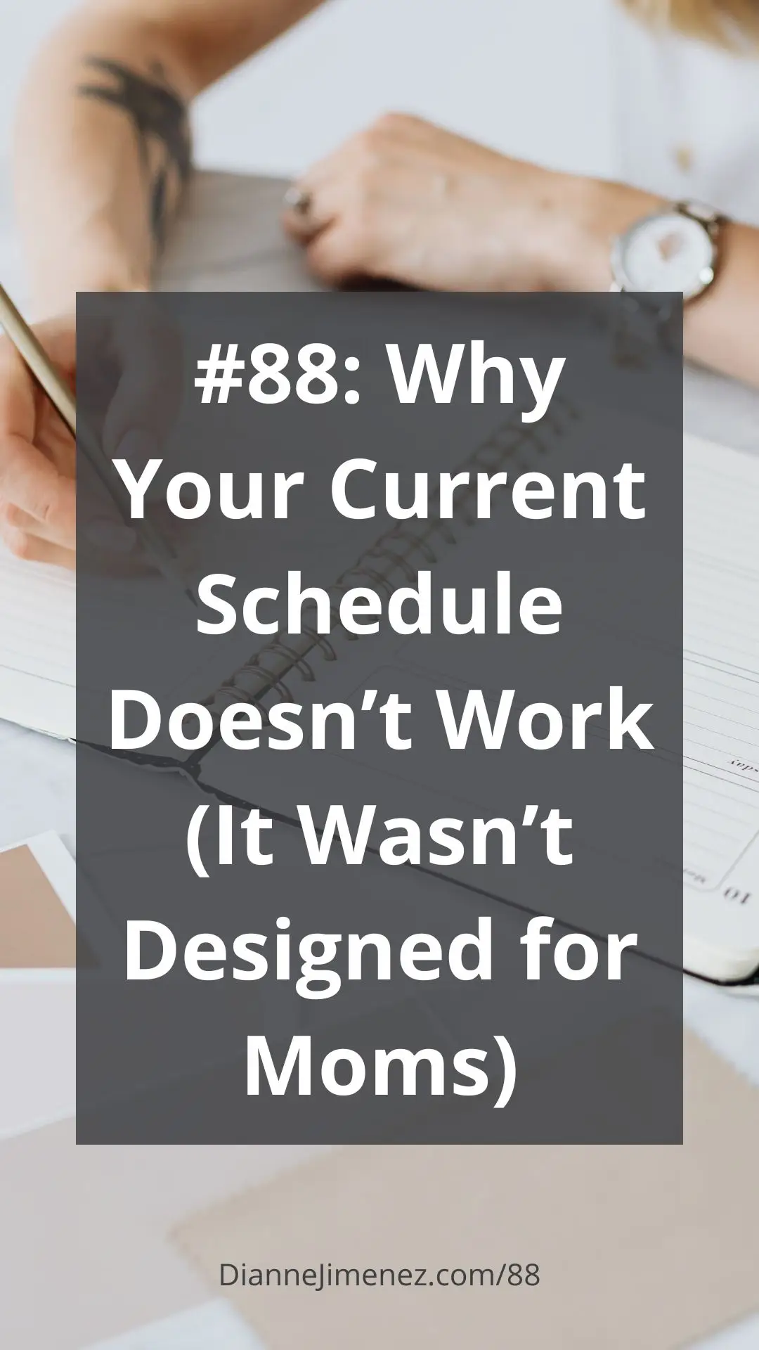 A woman is writing in her scheduler or planner